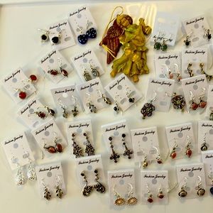 35 piece lot of ladies, beautiful sterling, silver earrings, beautiful jewelry
